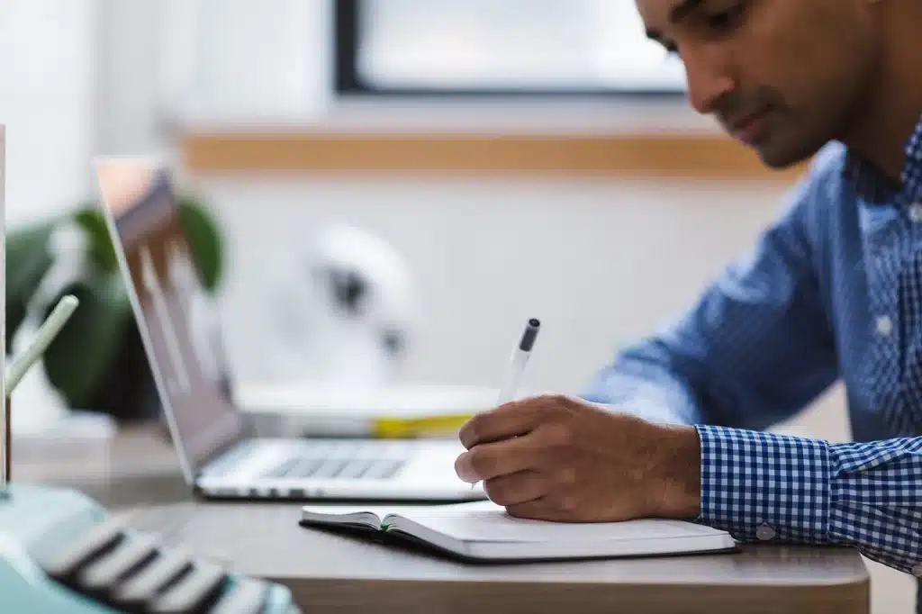 A man signing up for a research study